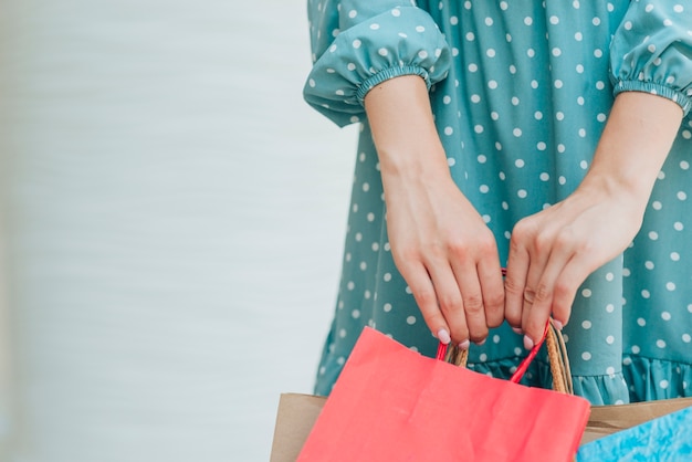 Young girl at shopping mall with copy space