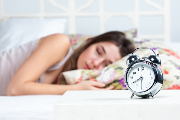 Free photo the young girl sleeping in bed