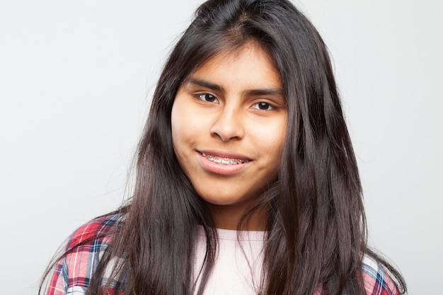 Free photo young girl smiling close up