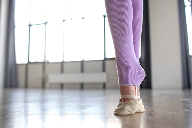 Young girl training in gymnastics