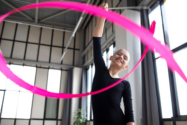 Young girl training in gymnastics