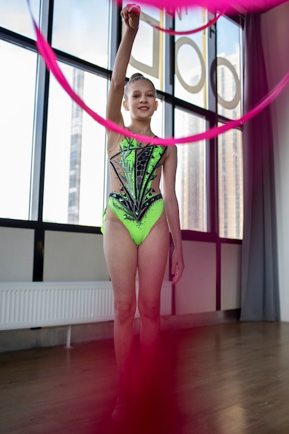 Young girl training in gymnastics