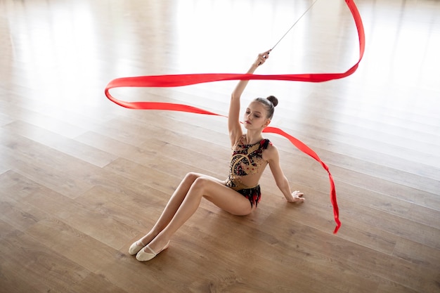 Young girl training in gymnastics