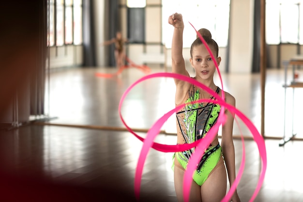 Young girl training in gymnastics