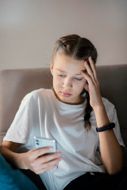 Young girl using mobile