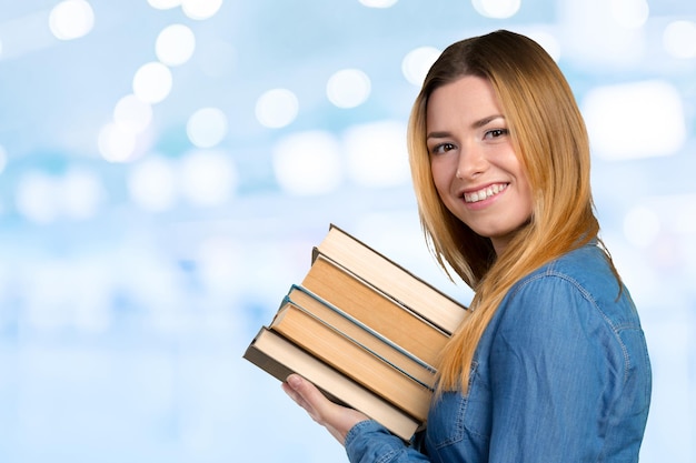 Young girl with books