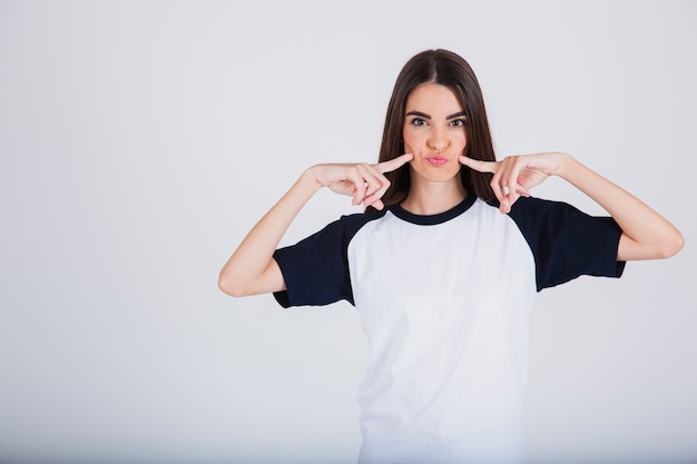 Free photo young girl with funny pose