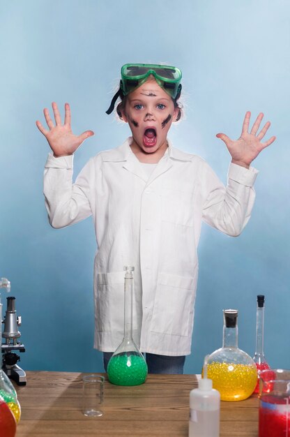 Young girl with lab coat