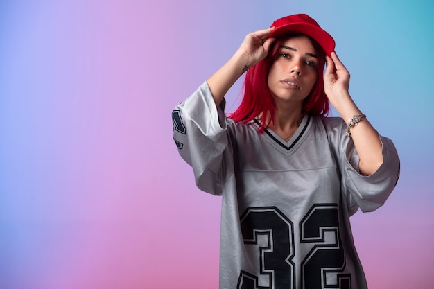 Young girl with pink hairs in street style outfits