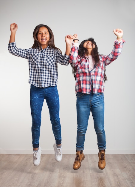 Young girls jumping