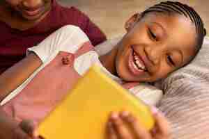 Free photo young girls spending time at home