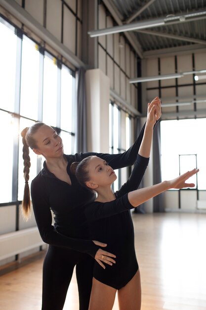 Young girls training together in gymnastics