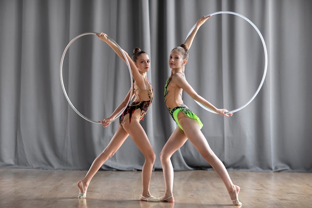 Young girls training together in gymnastics