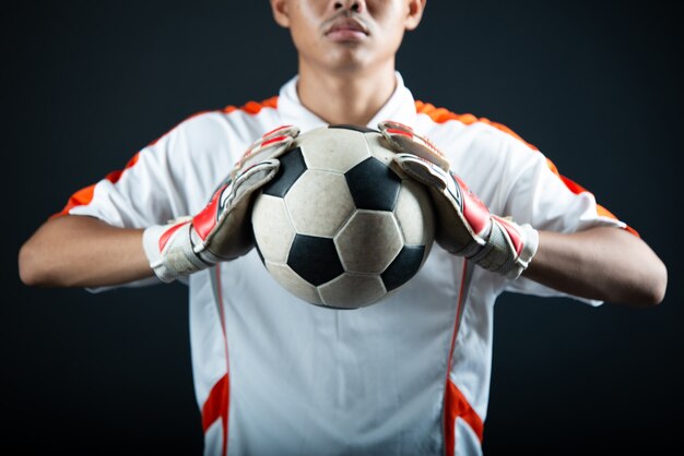 young goalkeeper soccer man isolated of academy soccer team