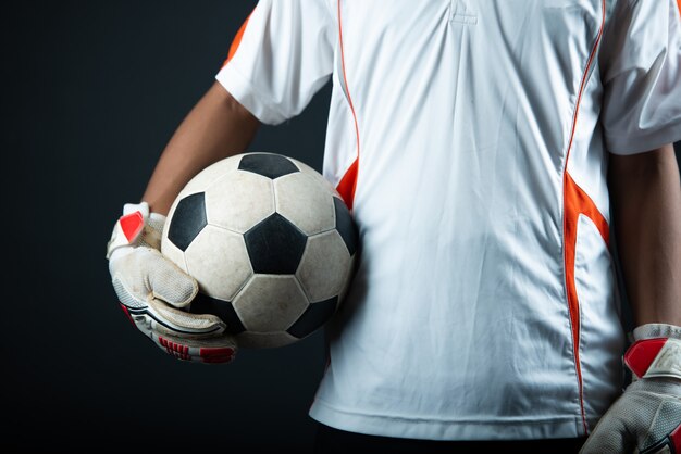 Young goalkeeper soccer man isolated of academy soccer team