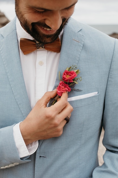 Young groom in blue costume