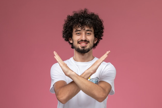 young guy shows close gesture