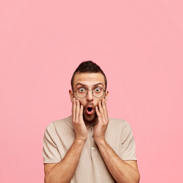 Young guy wearing round glasses