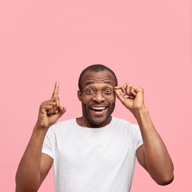 Young guy wearing round glasses