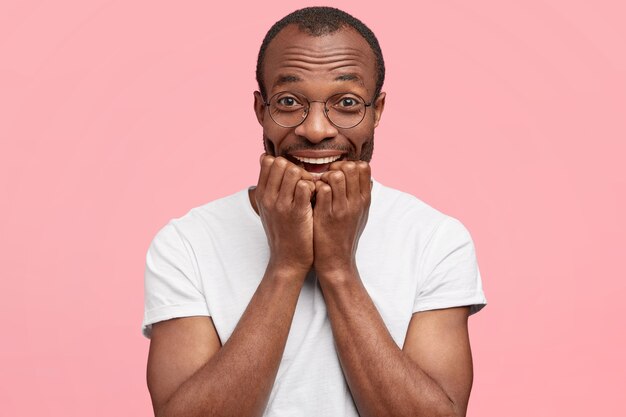 Young guy wearing round glasses