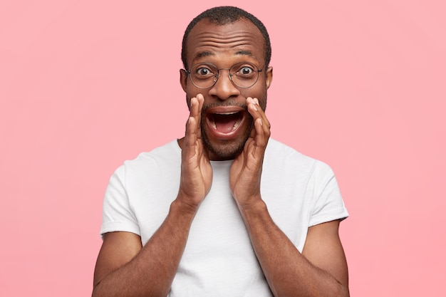 Young guy wearing round glasses