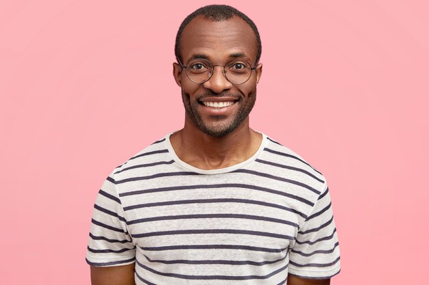 Young guy wearing round glasses