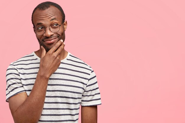 Young guy wearing round glasses