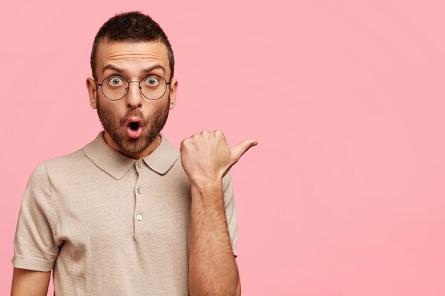 Young guy wearing round glasses