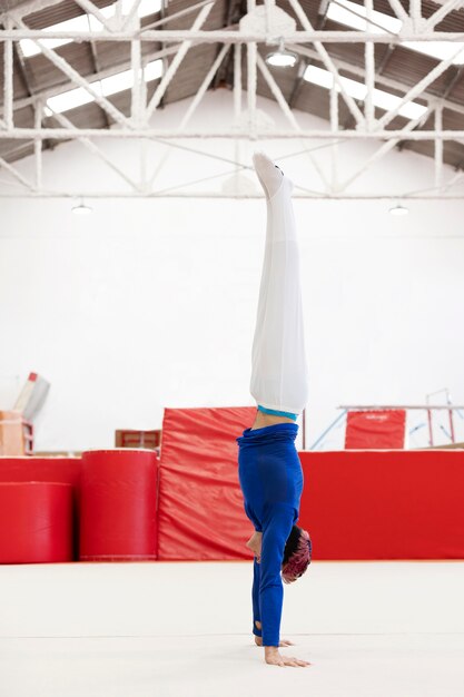 Young gymnast training for competition