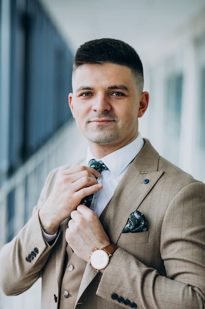 Free photo young handsome businessman posing portrait