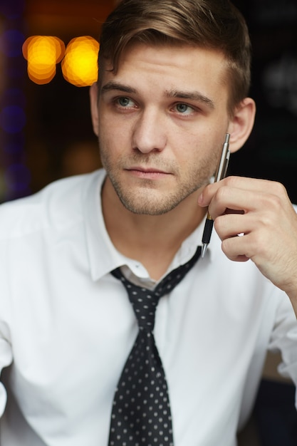 Free photo young handsome businessman at work