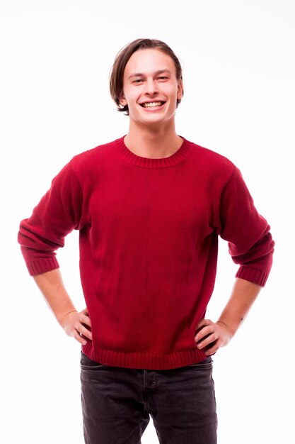 Young handsome guy posing casually isolated on white wall
