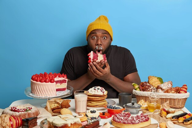 Young handsome man enjoying a wholesome dinner