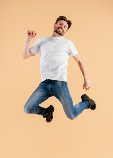 Free photo young handsome man jumping