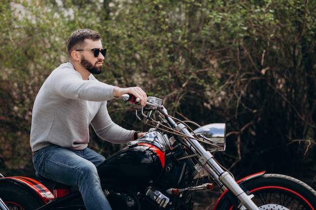 Free Photo | Young handsome man on motorcycle travelling