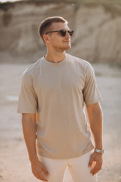 Young handsome man posing in quarry