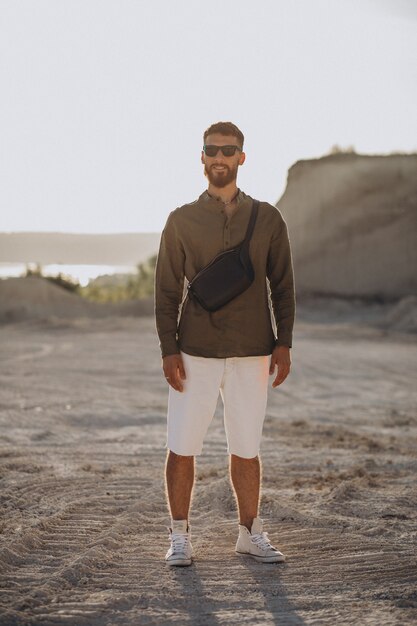 Young handsome man in a quarry alone