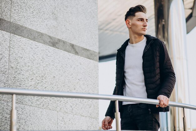 Young handsome man standing in the street Free Photo