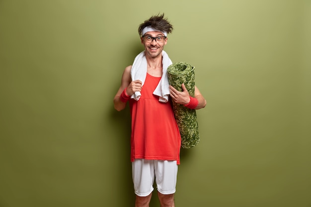 Young handsome man student with trendy hairstyle isolated