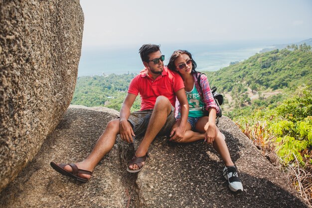 Young happy hipster couple in love traveling around world