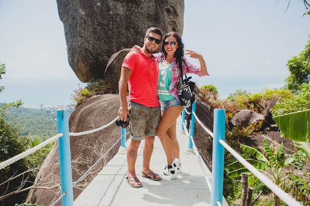 Young happy hipster couple in love traveling around world