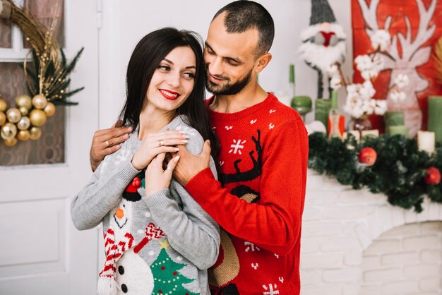 Young happy hugging couple