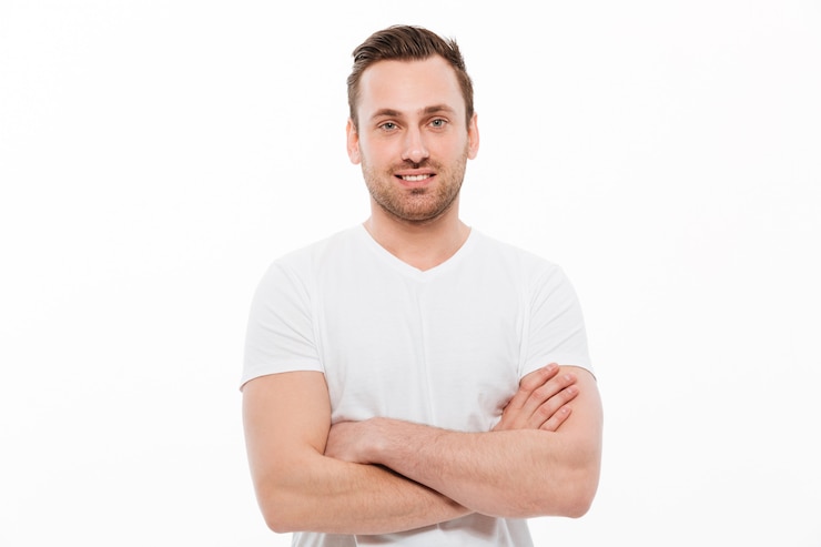 Free Photo young happy man standing isolated