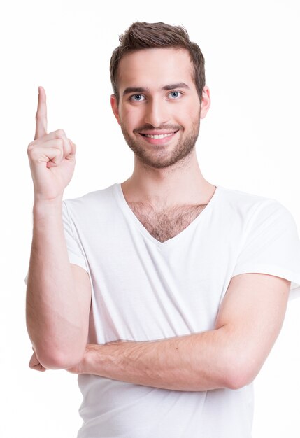 Young happy man with good idea sign  in casuals isolated on white background.