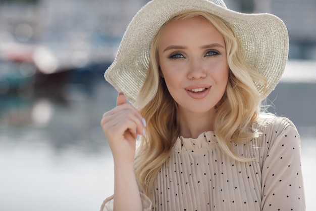 young happy woman in hap outdoors