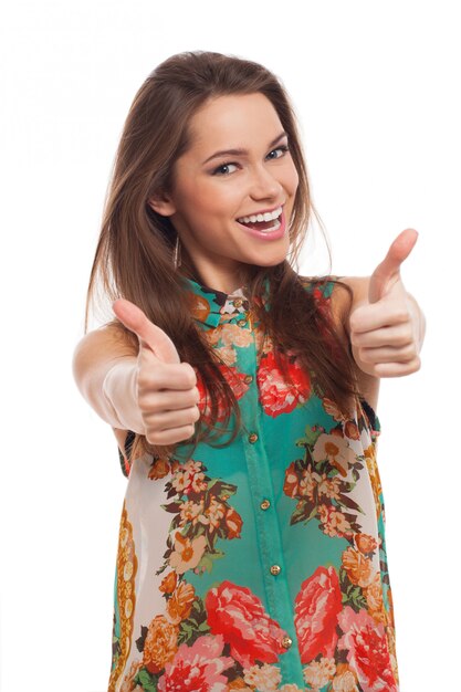 Young happy woman with thumbs up