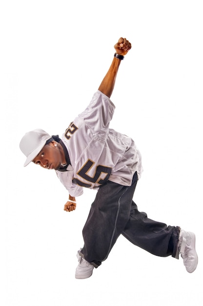 Бесплатное фото Молодой танцор хип-хопа на белом