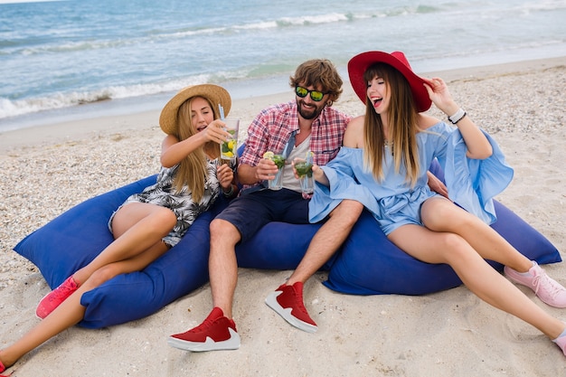 Young hipster company of friends on vacation