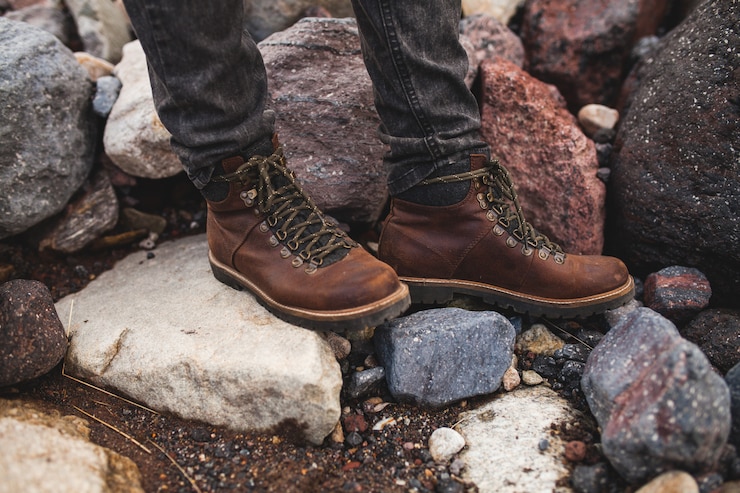 Free Photo young hipster man, hiking in wild nature, winter vacation