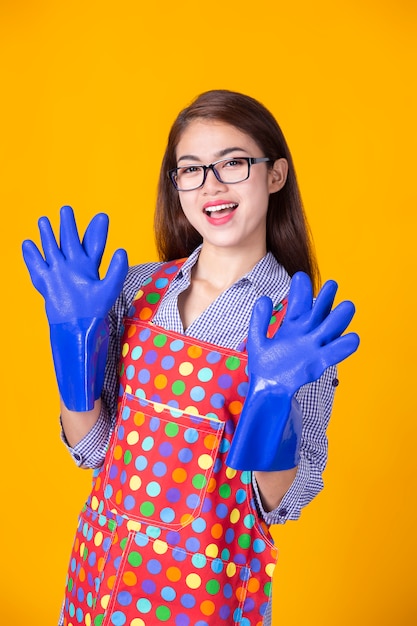 Young housekeeper female with cleaning supply